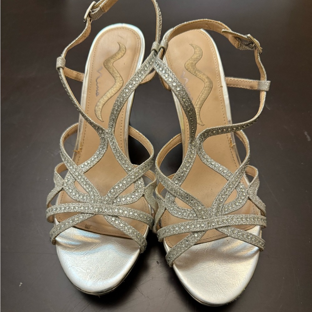 Sparkly silver studded 3 1/5 inch heels.